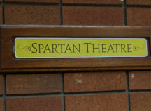 Photo of plaque that says "Spartan Theatre" on it.